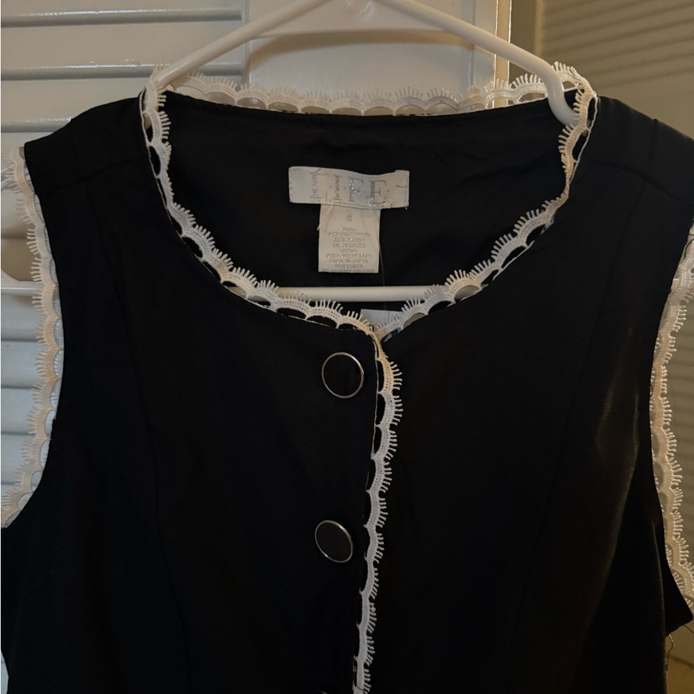 Black Sleeveless Vest with White Trim - Picture 2 of 2